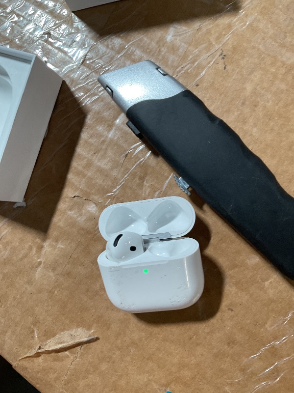 Photo 1 of ***MISSING PARTS***
Apple AirPods 4 Wireless Earbuds, Bluetooth Headphones, Personalized Spatial Audio, Sweat and Water Resistant, USB-C Charging Case, H2 Chip, Up to 30 Hours of Battery Life, Effortless Setup for iPhone