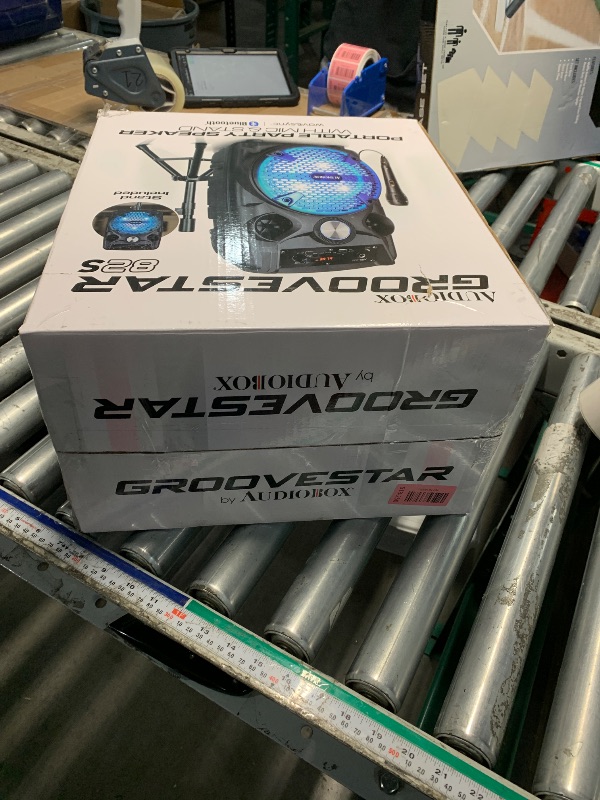 Photo 1 of ***MISSING PARTS***
Audiobox ABX-82S Portable Bluetooth Party Speaker with Stand - 8" Woofer 1100W WaveSync™ Technology, LED Lights, USB/TF Card/FM, Loud Bluetooth Speaker PA System w/Wired Microphone & USB Cable, Black