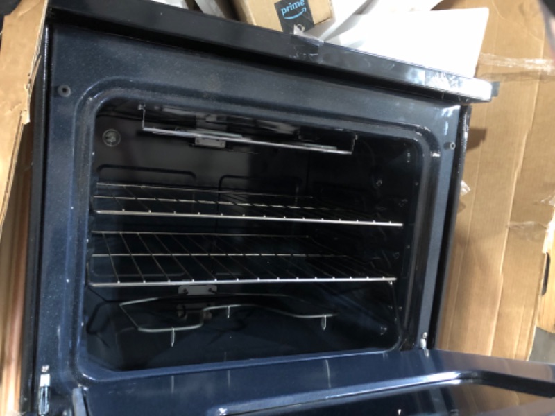 Photo 1 of ***DAMAGED - SEE NOTES/PICTURES*** 30 in. 4 Burner Element Free-Standing Electric Range in Black