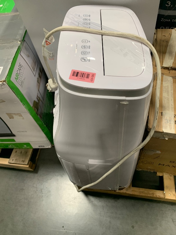Photo 1 of *** nonfunctional******DAMAGED DURING SHIPMENT******TRUCK/TRAILER PICKUP ONLY***15,000 BTU Portable Air Conditioner, White