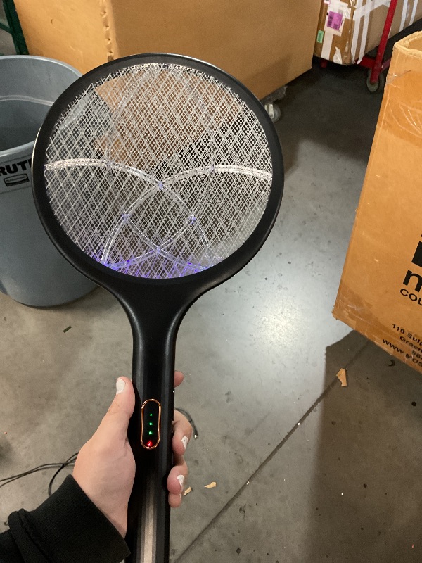 View 2 of ***ITEM TURNS ON- UNABLE TO TEST FURTHER***

YISSVIC Electric Fly Swatter 4000V Bug Zapper Racket Dual Modes Mosquito Killer with Purple Mosquito Light Rechargeable for Indoor Home Office Backyard Patio Camping (Black-1 Pack)