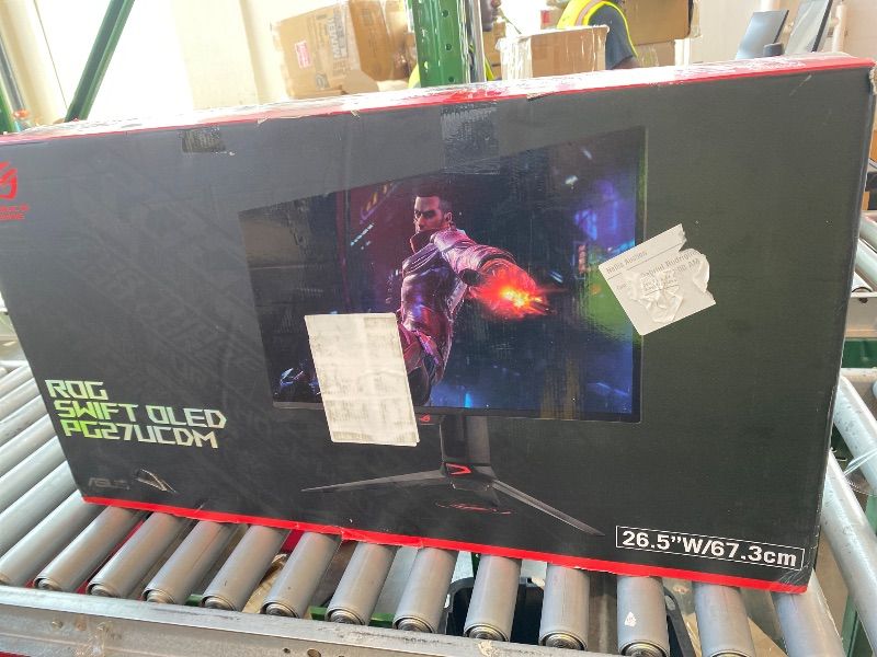 Photo 1 of [USED] ASUS ROG Swift 27” 4K QD-OLED Gaming Monitor (PG27UCDM) - 240Hz, 0.03ms, Custom Heatsink, Neo Proximity Sensor, G-SYNC Compatible, 99% DCI-P3, True 10-bit color, DisplayPort 2.1a UHBR20, 3 yr warranty