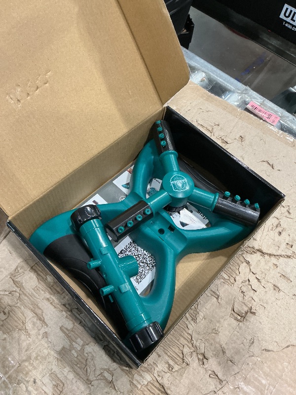 Photo 1 of **UNTESTED**
Joeys Sprinkler for Yard, Rotating Garden Sprinkler for Large Area Coverage, Lawn and Yard Sprinklers (Green)