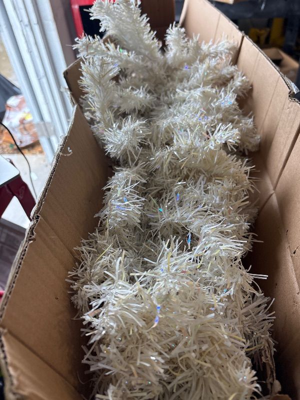 Photo 1 of **MISSING PARTS**
National Tree Company 4 ft Pre-Lit Mini Artificial Christmas Tree, White Iridescent Tinsel, 70 Clear Lights, 110 Tips, Includes Stand