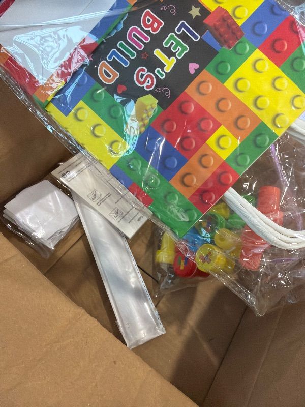 Photo 1 of **MISSING PARTS**
LiYiQ 134 Pcs Building Blocks Party Favors with Reusable Drinking Straws Animal Building Blocks Slap Bracelets Keychains Stamps Stickers and Gift Bags Gamer Birthday Party Supplies (Building)