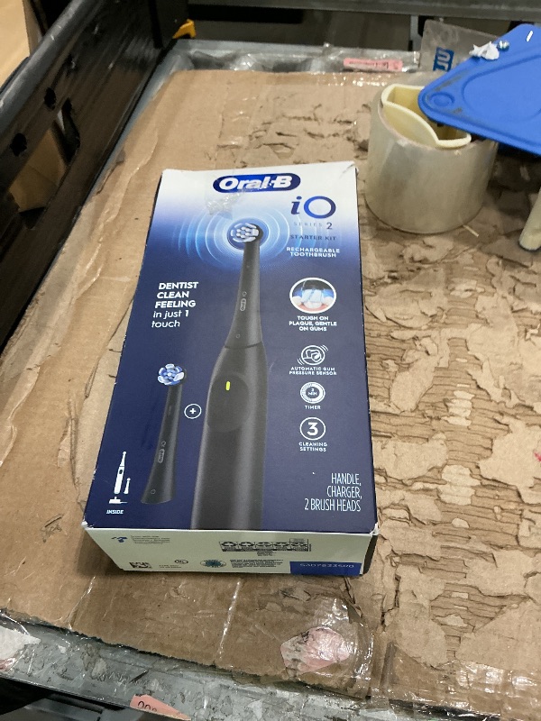 Photo 1 of **DAMAGED/MISSING PARTS**
Oral-B Rechargeable Electric Toothbrush, iO2 Starter Kit, 3 Cleaning Modes, Automatic Pressure Sensor to Protect Gums, 2 Brush Heads, Night Black