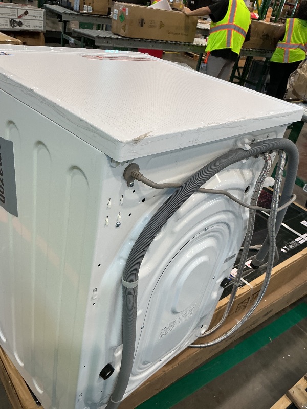 Photo 1 of *NON-FUNCTIONAL*
COMFEE' 24-inch washer and dryer combo in white.