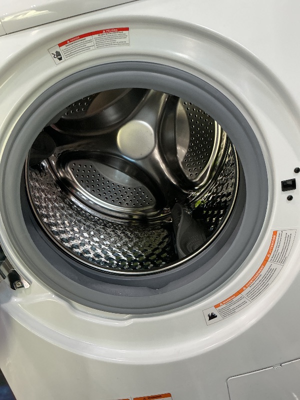 Photo 1 of *NON-FUNCTIONAL*
COMFEE' 24-inch washer and dryer combo in white.