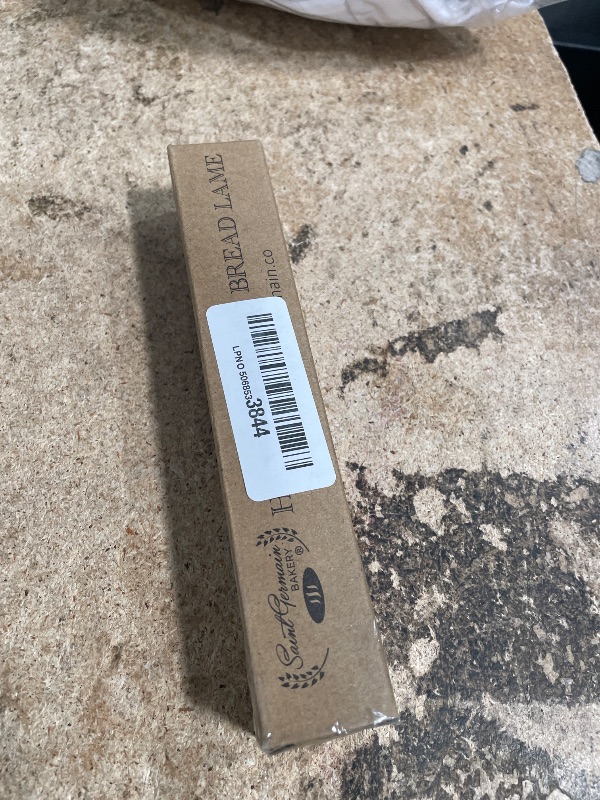 Photo 1 of "SAINT GERMAIN Premium Hand Crafted Bread Lame for Dough Scoring Knife, Lame Bread Tool for Sourdough Bread Slashing with 10 Blades Included with Replacement with Authentic Leather Protector Cover"