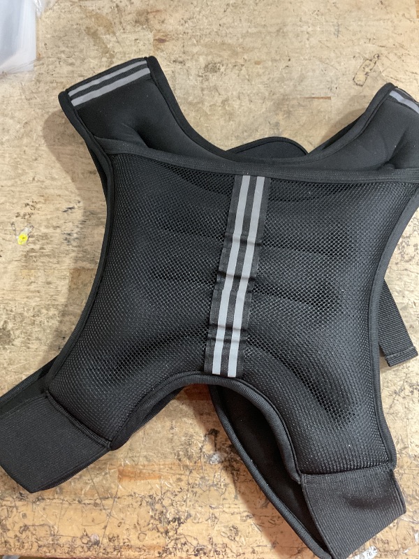Photo 1 of *UNKNOWN WEIGHT** WEIGTHTED VEST 