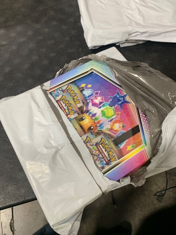 Photo 1 of missing binder ------------Pokemon TCG: Scarlet & Violet—Prismatic Evolutions Binder Collection