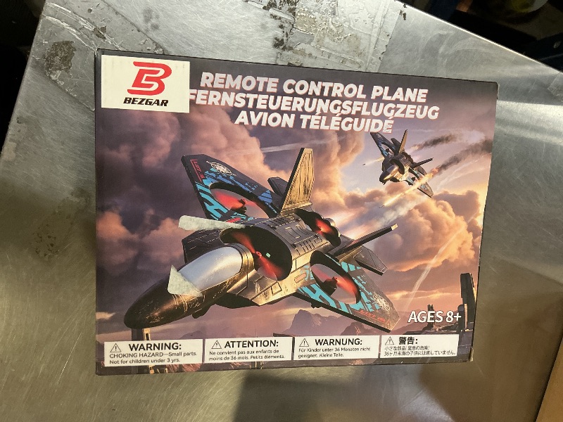 Photo 1 of BEZGAR Drones for Kids | 2.4GHZ RC Plane, Remote Control Airplane, RC Helicopter, 360° Flip Fighter Jet Toy with Colorful LED Navigation Light Blue