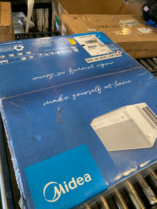 Photo 1 of Midea 12,000 BTU U Shaped Smart Inverter Window Air Conditioner - Cools 550 Sq Ft, Ultra Quiet with Open Window Flexibility - Alexa/Google Assistant Compatible - 35% Energy Savings, Remote (Updated)