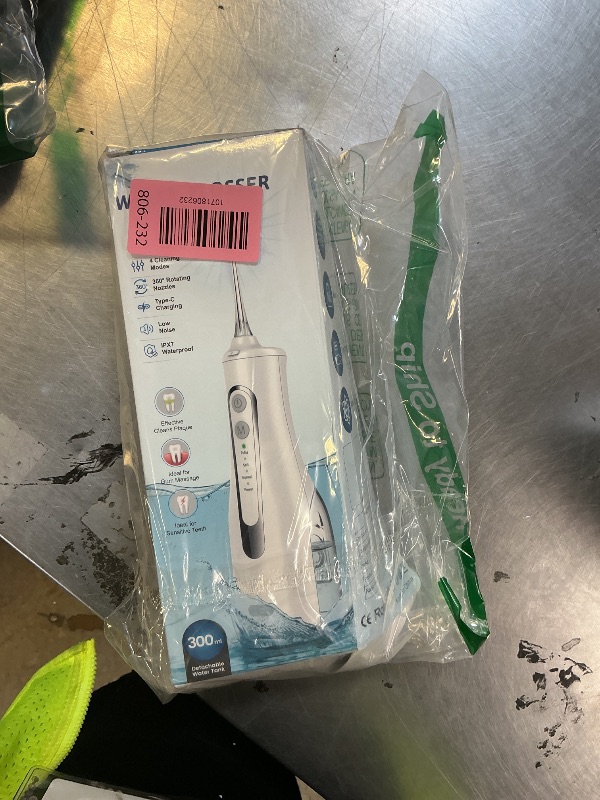 Photo 1 of **USED, INCOMPLETE** Water Dental Flosser 300ML Portable - 4 Modes Cordless Oral Irrigator - Rechargeable IPX7 Waterproof - Water Dental Piks for Cleaning for Home Travel
