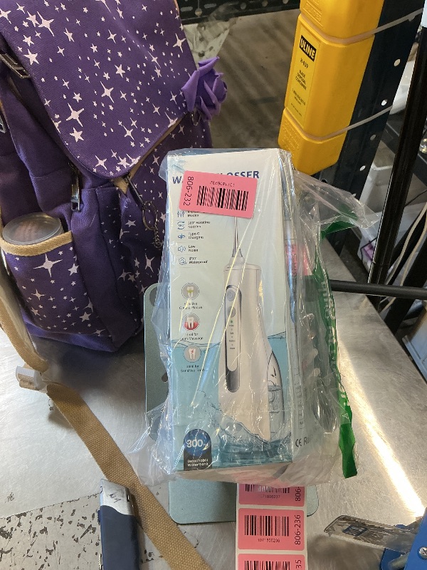 Photo 1 of **USED, INCOMPLETE** Water Dental Flosser 300ML Portable - 4 Modes Cordless Oral Irrigator - Rechargeable IPX7 Waterproof - Water Dental Piks for Cleaning for Home Travel
