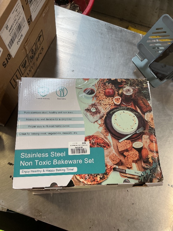 Photo 1 of E-far 12-Piece Stainless Steel Bakeware Sets, Metal Baking Pan Set Include Round Cake Pans, Square/Rectangle Baking Pans with Lids, Cookie Sheet, Loaf/Muffin/Pizza Pan, Non-toxic & Dishwasher Safe