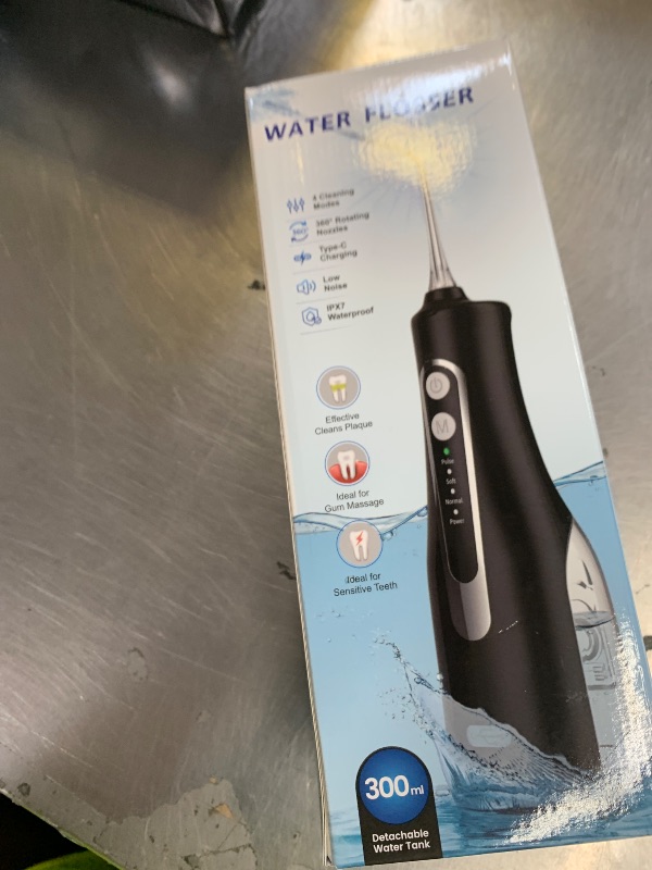 Photo 1 of Water Dental Flosser Teeth Pick - 4 Modes Cordless - Oral Irrigator - 300ML Portable and IPX7 Rechargeable Waterproof - Home and Travel Cleaning - Water Dental Piks Tooth Brush