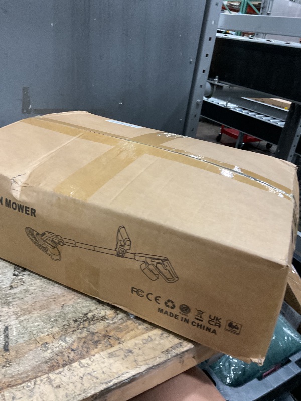 Photo 1 of 12-Inch Cordless Weed Wacker