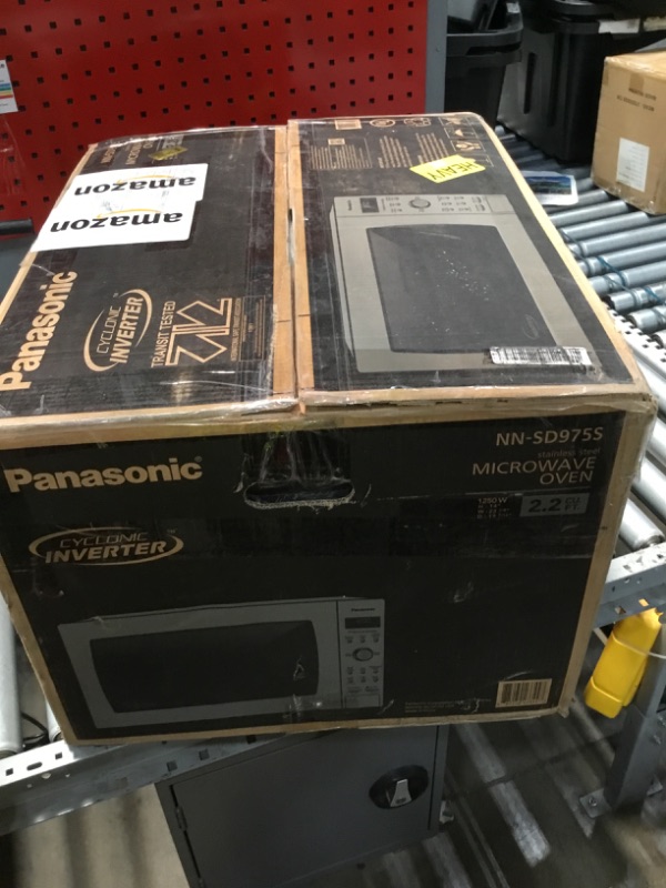 Photo 1 of (UNFUNCTIONAL, SOLD FOR PARTS) Panasonic Microwave Oven with Cyclonic Wave Inverter Technology, 1250W, 2.2 cu.ft. Countertop Microwave with Genius Sensor One-Touch Cooking – NN-SD975S (Stainless Steel/Silver)