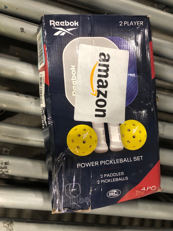 Photo 1 of ****SEE NOTES***Reebok - Pickleball Set for 2 Players, Fiberglass Power Paddles with 13mm Polypropylene Core, Comfort Grip Handles, Aero Flight Balls, Ideal for Sports and Enthusiasts