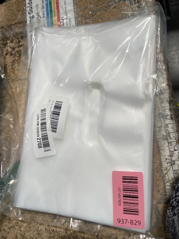 Photo 1 of 100 Pack Clear Plastic Bags, 9"x12" Merchandise Bags With Die Cut Handles