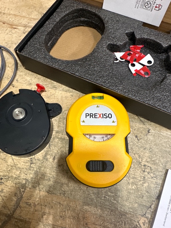 Photo 1 of  Laser Level LED Light Vial, 30Ft Horizontal & Vertical Line Laser with Wall Mount Base, 2 Pins, 10 Sticker, 2 AA Batteries for Hanging Frames & Picture, Construction Wall Writing