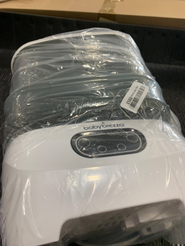 Photo 1 of Baby Brezza Bottle Sterilizer and Dryer Advanced – 33% Faster - Largest Capacity Steam Sanitizer - Universal Sterilization Machine for All Bottles + Pump Parts - HEPA Air Filter