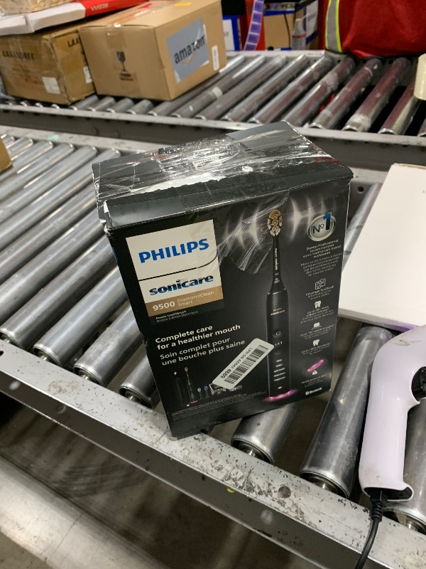 Photo 1 of Philips Sonicare DiamondClean Smart 9500 Electric Toothbrush - Sonic Toothbrush with App, Pressure Sensor, 15 Brushing Settings, Replacement Reminder, USB Charging Travel Case, Black, Model HX9923/11