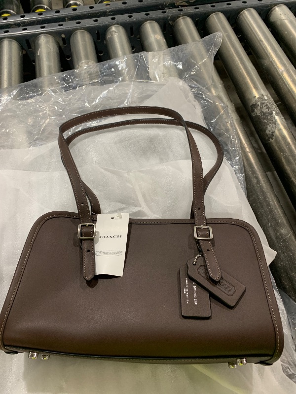 Photo 1 of COACH Women's Swing Zip Bag, LH/Maple, One Size