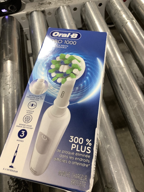 Photo 1 of Oral-B Pro 1000 Rechargeable Electric Toothbrush, White