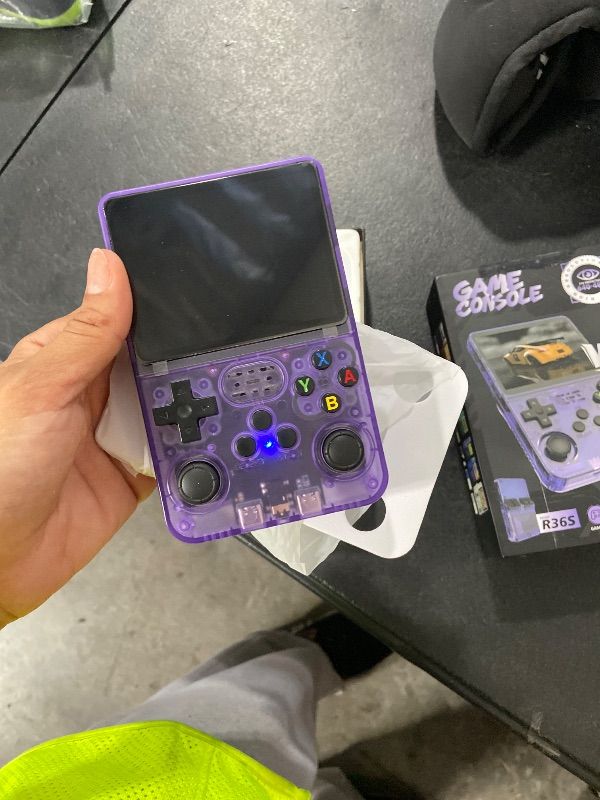 Photo 1 of R36s Pro Retro Handheld Game Console, 3.5in IPS , 128GB Preloaded with 40000+Classic Games, Portable Game Console,30 +Game Emulator, Linux System,3500mah Rechargeable Battery (128G Purple)