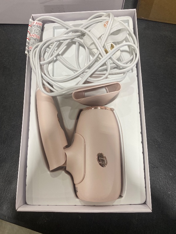 Photo 1 of T3 Afar Lightweight Travel-Size Hair Dryer with Auto Dual Voltage, Folding Handle, Fast Drying, Lightweight and Ergonomic, Frizz Smoothing, Multiple Heat and Speed Combinations