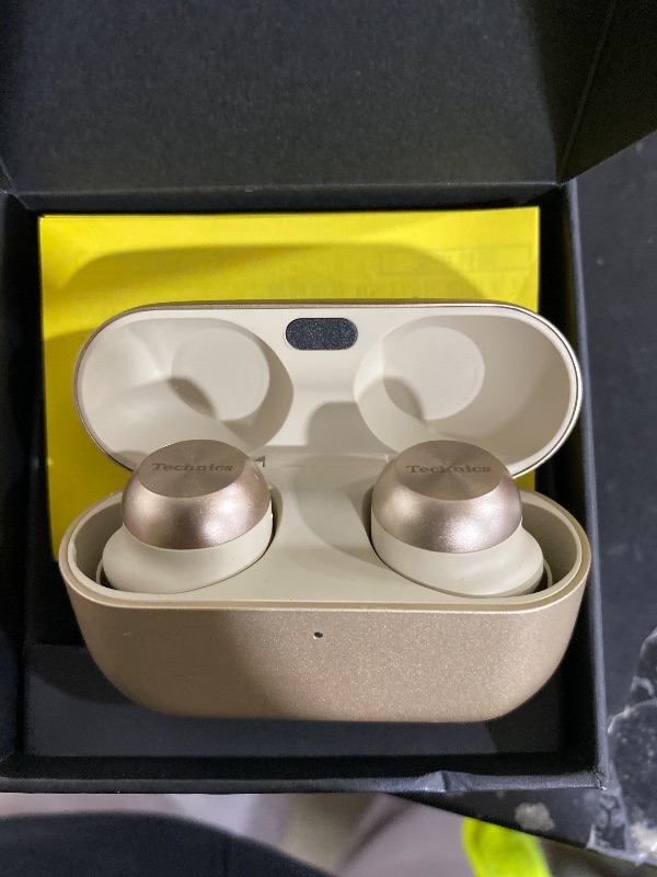 Photo 1 of Technics Reference Class Hi-Fi Wireless Ear Buds, Dolby Atmos with Head Tracking, Adaptive Noise Cancelling, 3 Device Multipoint, 10-Hr Battery, Wireless Charging, Improved Fit, EAH-AZ100-N(Champagne)