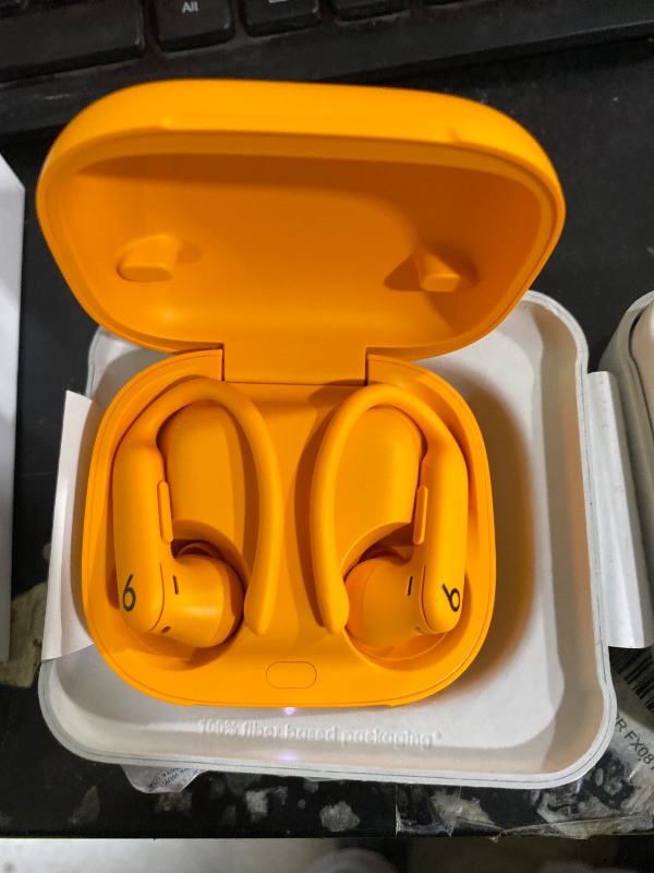 View 4 of Beats by Dr. Dre Powerbeats Pro 2 Wireless Noise-Canceling Earbuds (Electric Orange)