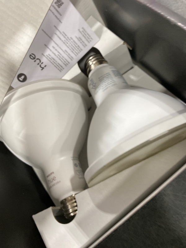 Photo 1 of PHILIPS Hue Smart 100W PAR38 LED Bulb, 2 Pack, White & Color Ambiance Color-Changing Light, 1300LM, E26, Outdoor Light Bulbs, Control with Hue App, Works with Alexa, Google Assistant and Apple Homekit