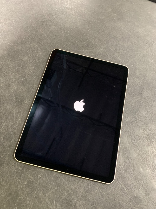 Photo 1 of Apple iPad Air (5th Generation): with M1 chip, 10.9-inch Liquid Retina Display, 64GB, Wi-Fi 6, 12MP front/12MP Back Camera, Touch ID, All-Day Battery Life – Starlight