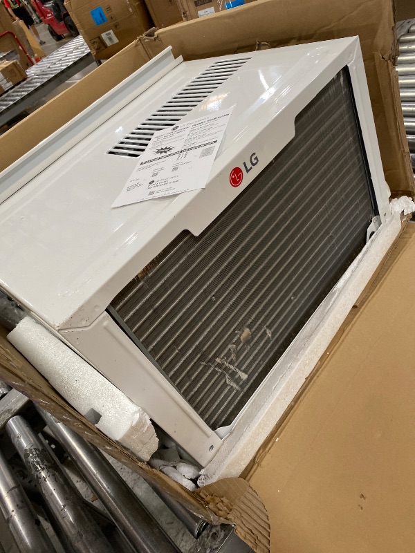 Photo 1 of *** PARTS ONLY *** LG 12,200 BTU Window Air Conditioner with Supplemental Heat, 230/208V, Cools 570 Sq.Ft. (19' x 30' Room Size), Electronic Controls with Remote, 2 Cooling, Heating & Fan Speeds, Slide In-Out Chassis