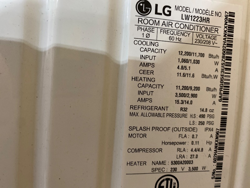 Photo 1 of *** PARTS ONLY *** LG 12,200 BTU Window Air Conditioner with Supplemental Heat, 230/208V, Cools 570 Sq.Ft. (19' x 30' Room Size), Electronic Controls with Remote, 2 Cooling, Heating & Fan Speeds, Slide In-Out Chassis