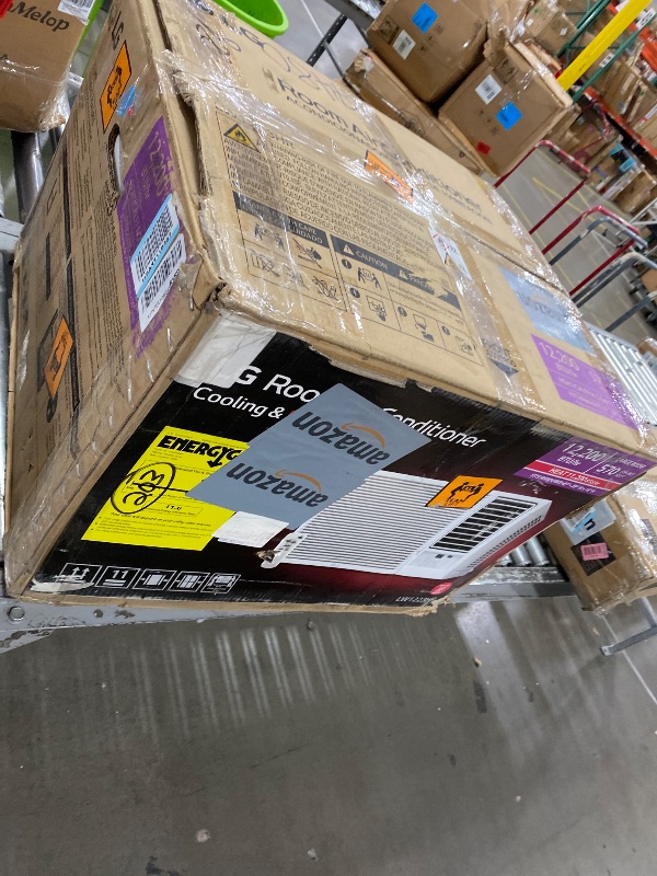 Photo 1 of *** PARTS ONLY *** LG 12,200 BTU Window Air Conditioner with Supplemental Heat, 230/208V, Cools 570 Sq.Ft. (19' x 30' Room Size), Electronic Controls with Remote, 2 Cooling, Heating & Fan Speeds, Slide In-Out Chassis