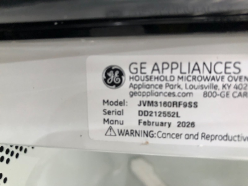 Photo 1 of *HEAVILY DAMAGED* GE 30" Over-the-Range Microwave, 1.6 Cu. Ft., 1000 Watts, 300 CFM Hood Vent, LED Lighting, Auto Defrost, Easy Mount Install, Stainless Steel, JVM3160RFSS