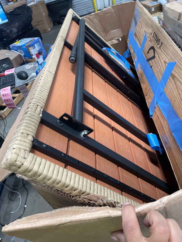 Photo 1 of **INCOMPLETE** Rattan outdoor table