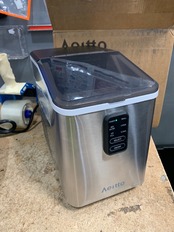Photo 1 of *DEFECTIVE* Aeitto Ice Maker Countertop 26lbs/24H, Ice Machine 8 Ice Cubes Ready in 6 Mins, 2 Sizes of Bullet Ice Portable Ice Makers with Basket & Scoop, Auto Self-Cleaning for Home/Kitchen/Office Stainless