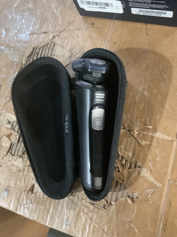 View 4 of * might be broken?*
Philips Norelco Shaver Series 9400 Wet and Dry Electric Shaver, with Lift and Cut Shaving System and SenseIQ Technology, Pop-up Trimmer, Model S9606/80