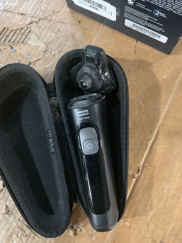 View 3 of * might be broken?*
Philips Norelco Shaver Series 9400 Wet and Dry Electric Shaver, with Lift and Cut Shaving System and SenseIQ Technology, Pop-up Trimmer, Model S9606/80