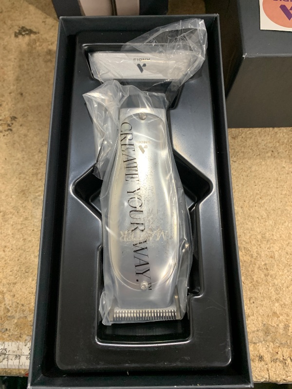 Photo 1 of Andis 12660 Professional Master Corded/Cordless Hair Clipper, Adjustable Carbon Steel Blade Hair Clipper for Close Cutting, Silver