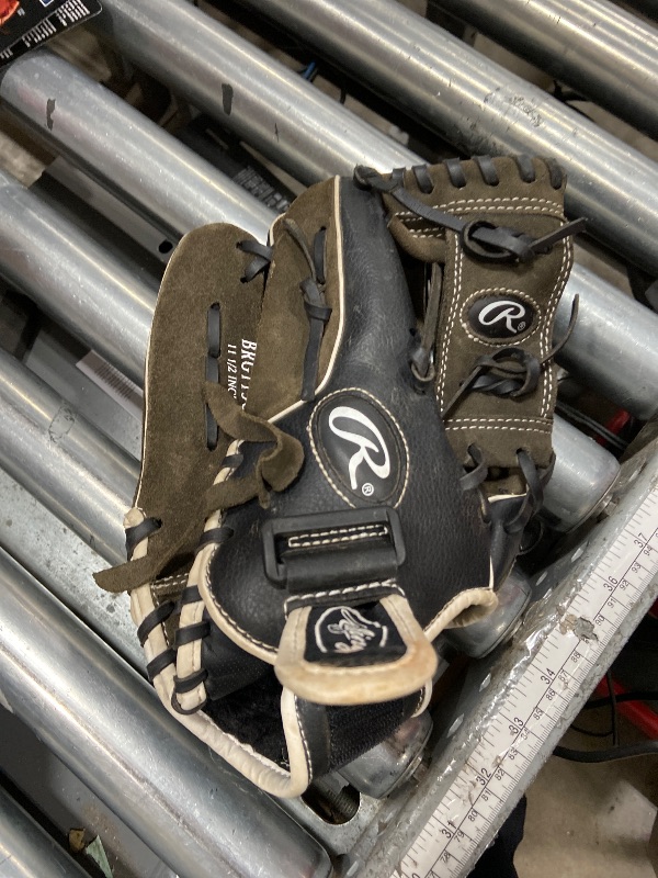 Photo 1 of **DIRTY**Rawlings baseball glove