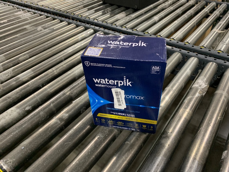 Photo 1 of Waterpik Promax Water Flosser with SmartAdvance Mode for Daily Gum Health and Cleaning Teeth, Braces, Implants, ADA Accepted, Small Quiet Design, Electric Flosser with 10 Settings, 5 Tips, WF-23