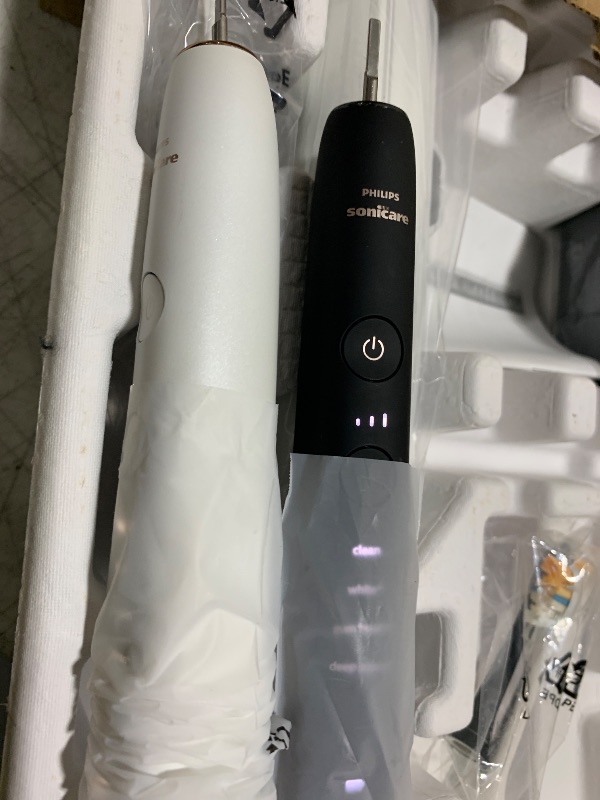 Photo 1 of Philips Sonicare DiamondClean Connected Electric Toothbrush 2 Pack, x2 Sonic Toothbrushes, x2 Charging Travel Cases, x2 A3 Brush Heads, 12 Brushing Settings, (Black and Rose Gold) Model HX9912/71