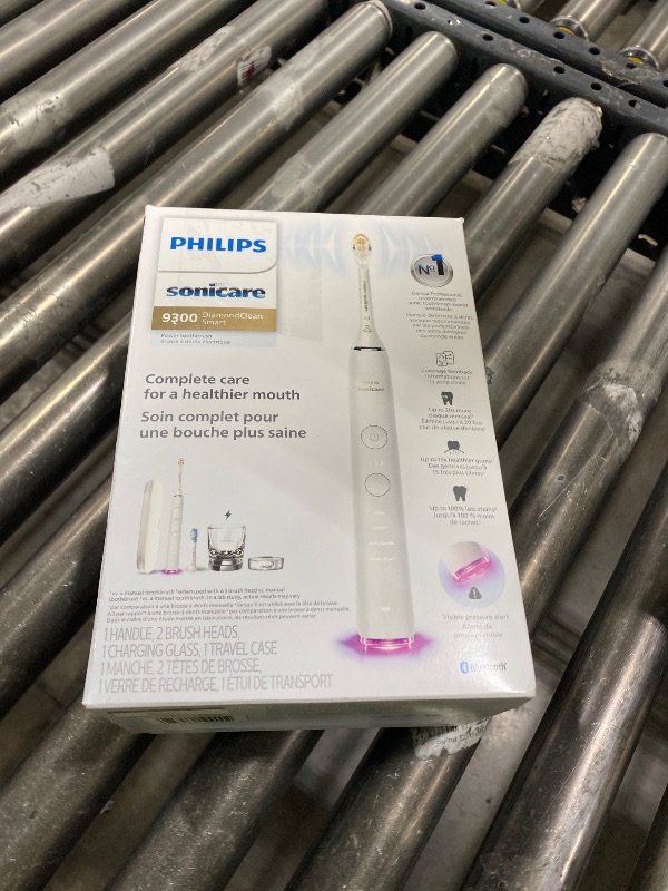Photo 1 of Philips Sonicare DiamondClean Smart 9300 Electric Toothbrush - Sonic Toothbrush with App, Pressure Sensor, 12 Brushing Settings, Replacement Reminder, Travel Case, White, Model HX9903/05