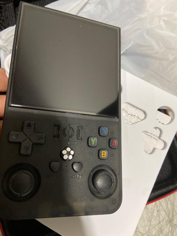Photo 1 of R36MAX Retro Handheld Game Console, 4.0 Inch IPS Screen Retro Gaming Console,Linux System, 4000mAh Battery Portable Pocket Mini Arcade, Built-in 128G,Retro Black